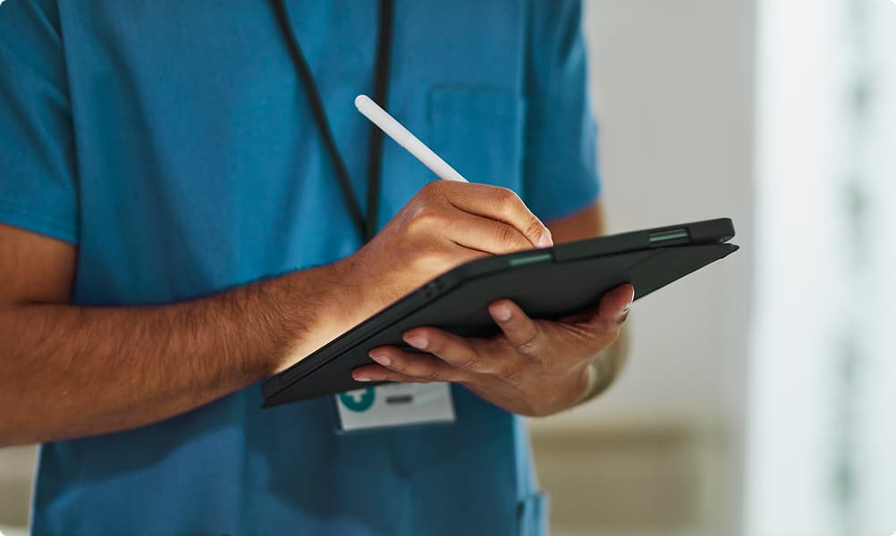 Medical worker using tablet